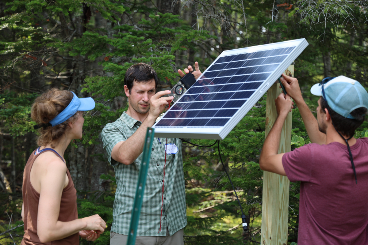 Picture of teachers assembling a solar array